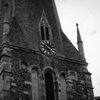 church with clock at center