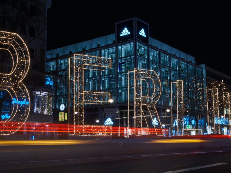 Berlin lighted free standing signage during night time