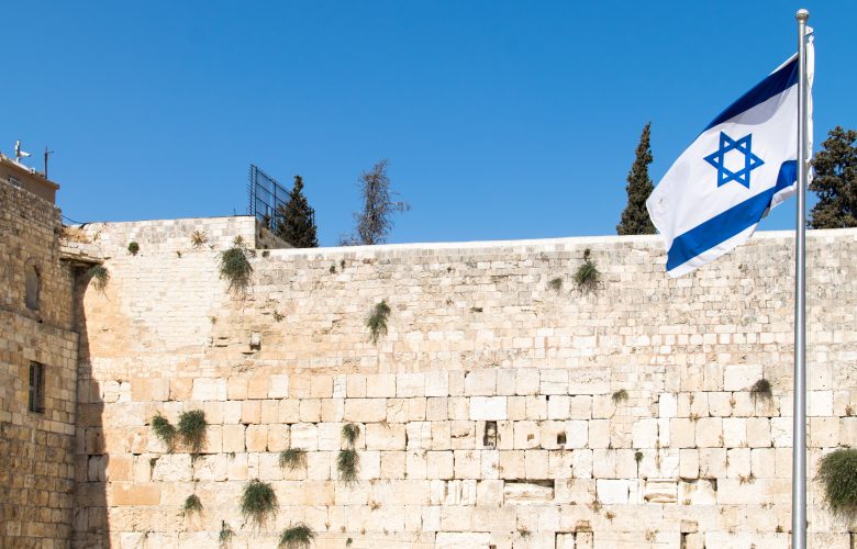 white concrete wall under blue sky during daytime