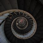 architectural photography of black and gray spiral stair